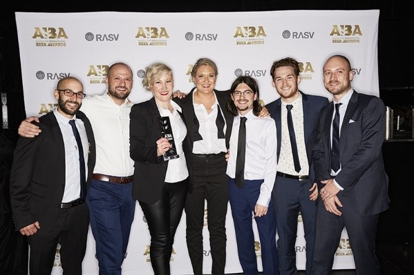 Jayne Lewis and Danielle Allen with the Two Birds brewing team receiving the Champion Medium Australian Brewery trophy at the 2016 AIBA