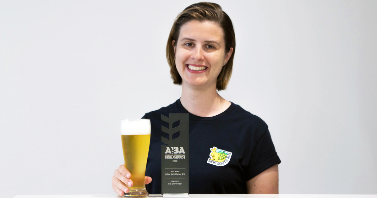 Marie Claire Jarratt pictured with the AIBA Best Media trophy 2019 presented by The Crafty Pint.