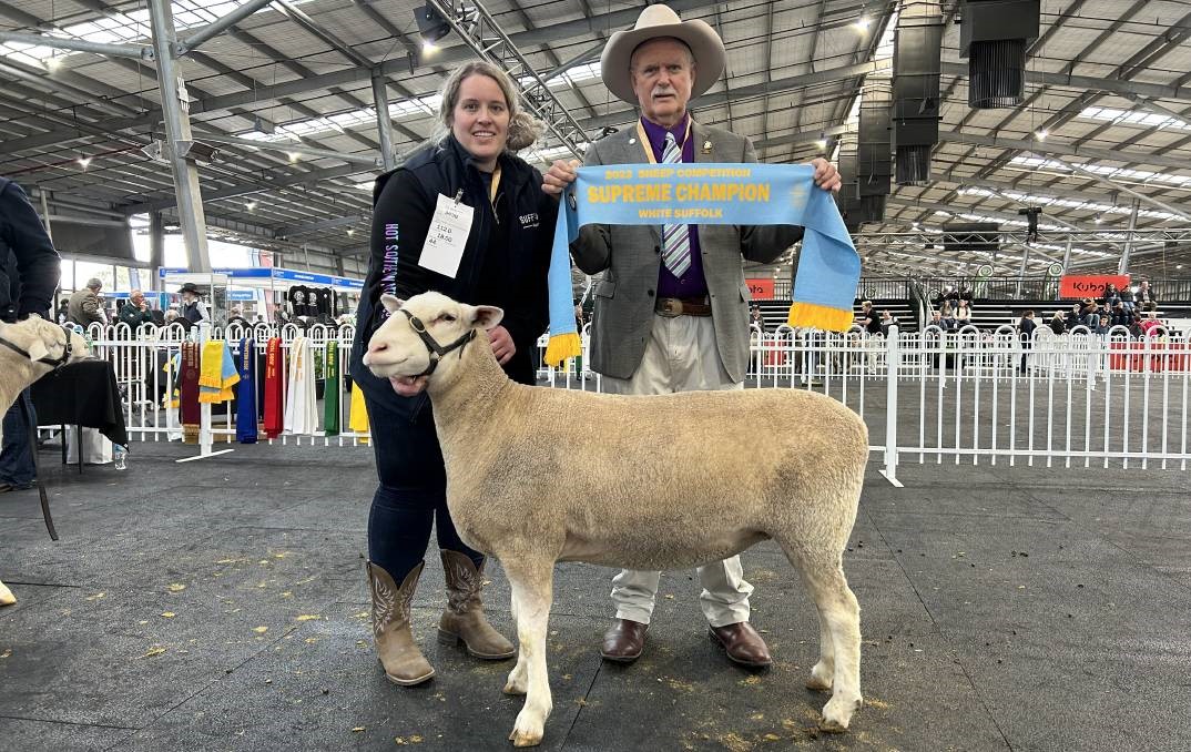 Rebecca Deppeler, Deppeler Suffolk stud, Derrinallum, and Melbourne Royal Show sheep committee chair Gavin Hall, with the supreme champion White Suffolk. Picture by Joely Mitchell
